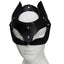Front view of a black faux leather fox face mask with wide slanted eye holes and pointed ears worn on a mannequin head.