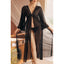 A model wears a full length sheer black robe with an empire waistline. 