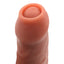 This firm yet flexible dildo has a realistic sculpted uncut design w/ foreskin & works w/ the Handbag Sex Machine or strap-on harnesses for versatile play. Close up.