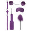The Ouch! Introductory Bondage Kit #4 has cuffs, spanking paddle, satin eye mask, feather tickler & breathable ball gag for kinky couples to start exploring BDSM. Purple.