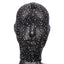 A mannequin wears a full face black mesh hood covered in rhinestones.