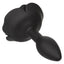 A large black silicone butt plug lays on its side and showcases its tapered tip.