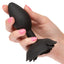 A hand model holds a large black silicone rose ankle butt plug for scale.