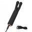 A black mini dual ear vibrating massager features its charging cord.