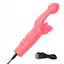 A pink butterfly rabbit vibrator lays next to its charging cord. 
