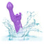 A purple butterfly rabbit vibrator is shown dropped in water showcasing its waterproof design. 