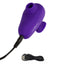 A purple clitoral suction finger vibrator lays next to its charging cord. 