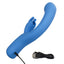 A blue rabbit clitoral suction vibrator lays next to its charging cord. 