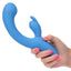 A hand model holds a blue clitoral suction g-spot rabbit vibrator for scale. 
