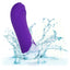 A thick purple silicone g-spot vibrator is shown in water to showcase its waterproof design. 
