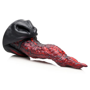 A dildo that is a heavily textured, pointy red and black dragon tongue coming from a black snout-shaped base.