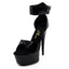 A single black patent Ellie Aliya Shoe platform stiletto with double ankle cuff shows its peep toe design.