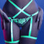 Close up of a model wearing a glow in the dark cage strap teddy that features detachable garters attached to the panty. 