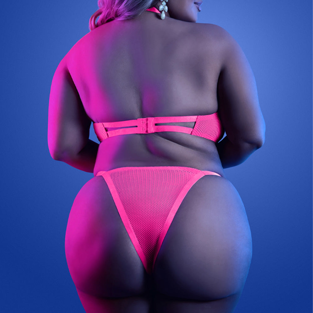Back view of a curvy model wearing a neon pink bra with hook-and-eye closure and triangle-cut panty with elastic side straps.