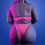 Back view of a curvy model wearing a neon pink bra with hook-and-eye closure and triangle-cut panty with elastic side straps.