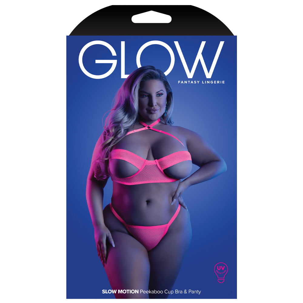 A Fantasy Lingerie box sits against a white backdrop with a plus size model on it wearing a neon pink net bra and panty set.
