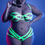 A plus-size model wears a glow-in-the-dark bandage-style strappy bra and panty set with underwired balconette cups.