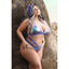 A plus size model poses in the desert and wears a wire-free hooded bralette and high waisted panty Fantasy Lingerie set.