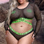 A plus size model wears a long-sleeve black fishnet crop top, panties and neon green cross-shaped nipple pasties.