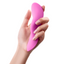 A hand model holds a hot pink slimline panty vibrator.