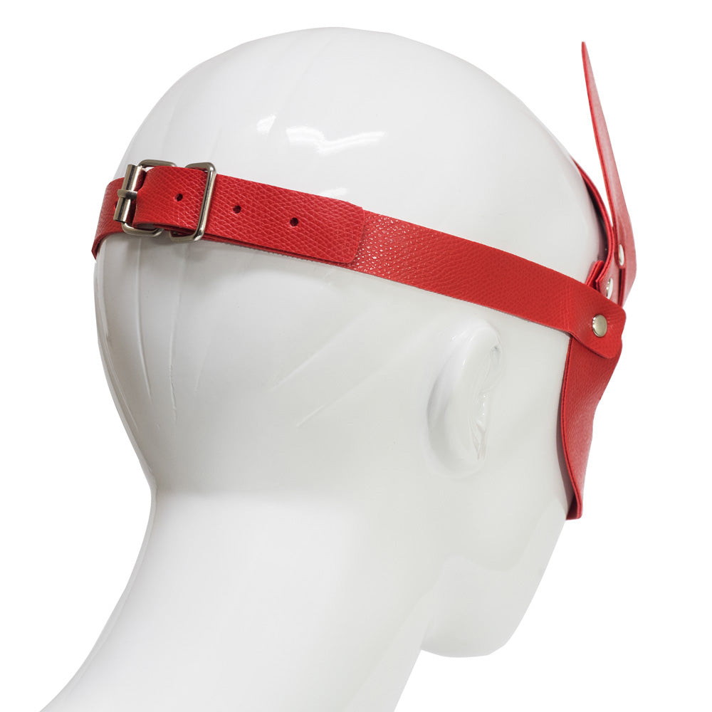Back view of a mannequin's head wearing a red fox face mask with a buckled faux leather strap that goes around the head.