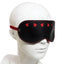 A mannequin wears a black faux leather eye mask with red cutout hearts in a row along the top on its face.