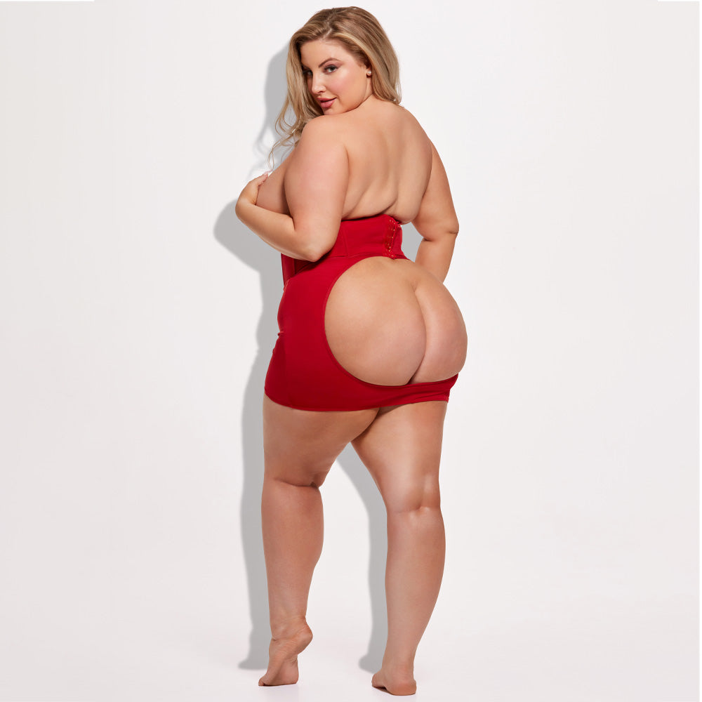 Back view of a plus-size model wearing an open-rear shapewear slip in red that has an adjustable hook-and-eye closure.