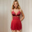 A model wears a red cutout lace and mesh babydoll with dainty cutouts at the upper breast area and around the underbust.