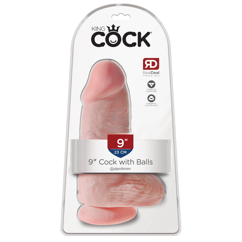 A realistic 9 inch veiny shaft dildo featuring a suction cup base stands in its package by King Cock.
