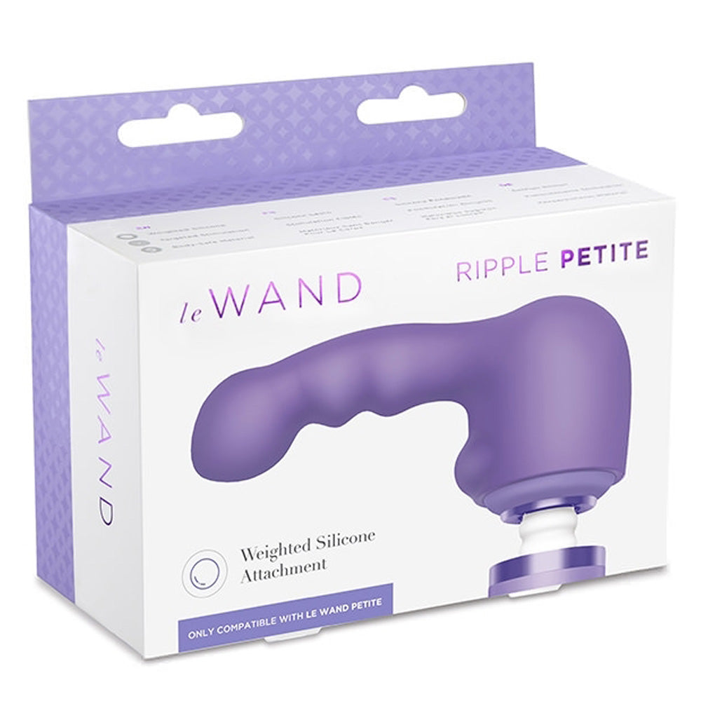 A box with the Le Wand ripple petite attachment in violet sits against a white backdrop. 