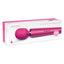 A Le Wand rechargeable vibrating massager sits in its package against a white backdrop.