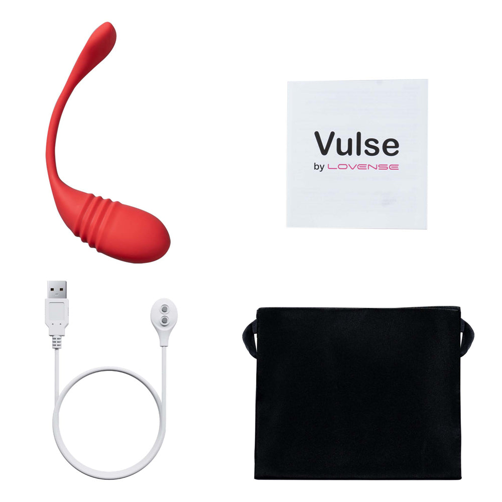 A flat lay of the red Lovense Vulse thrusting G-spot egg vibrator next to its instructions, charging cable and storage bag.