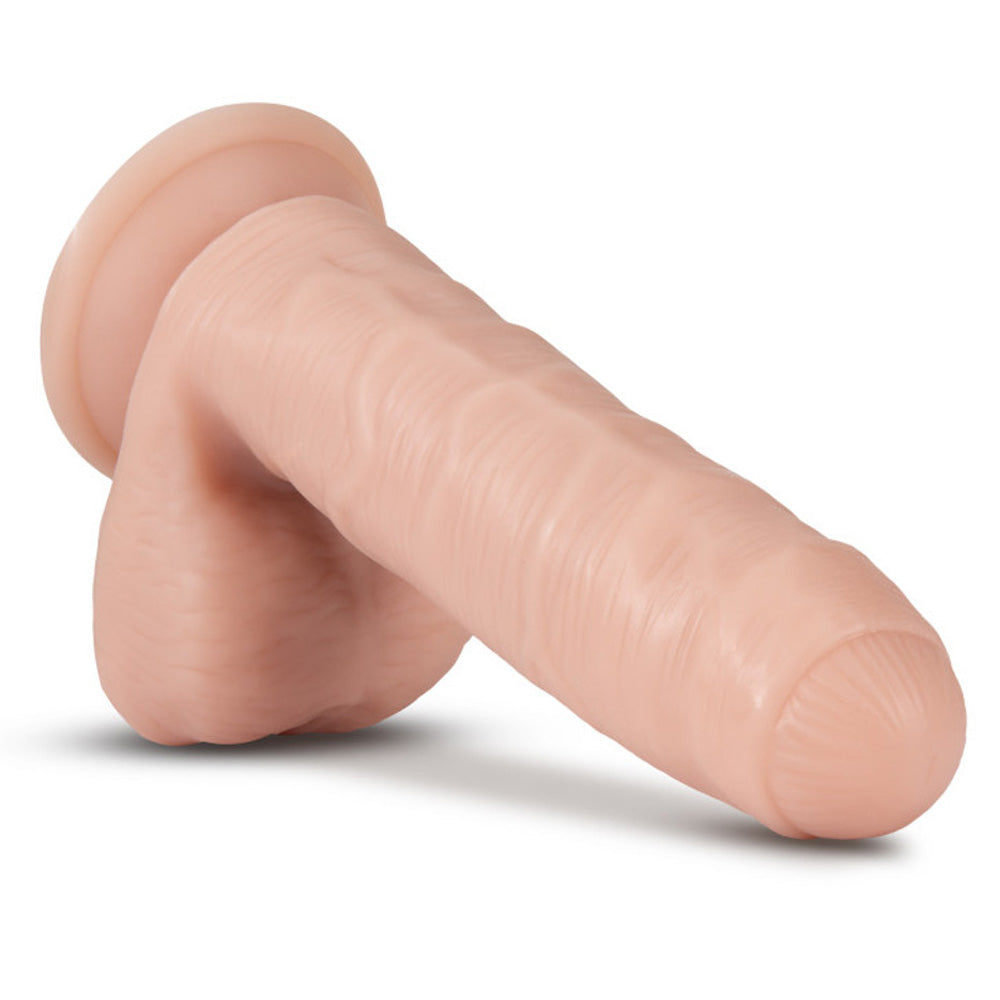 Front view of Loverboy Tony The Waiter 7 inch dildo shows off its veiny shaft texture and thick testicles. 