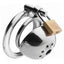 An extremely short stainless steel chastity cock cage with urination openings is padlocked shut against a white background.