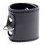 A 2-inch wide black faux leather ball stretcher with a metal D-ring at its centre sits on a white backdrop. 