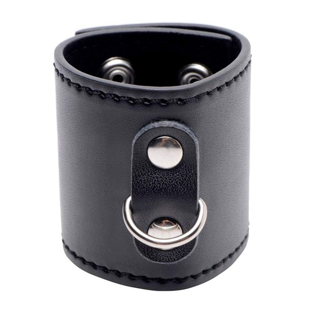 A faux leather ball stretcher shows its adjustable snap button closure and D-ring for attaching weights or a leash.