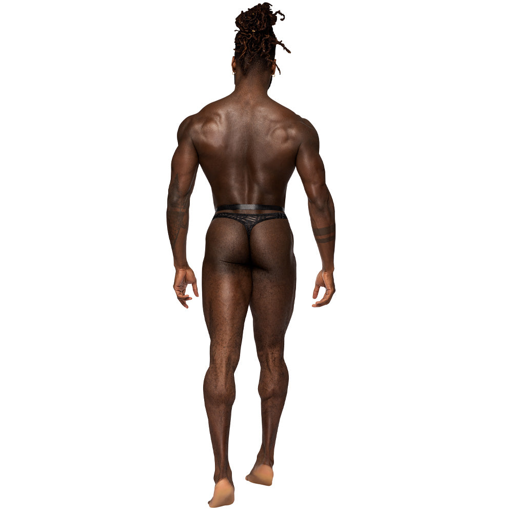 Back shot of a male lingerie model wearing a high-cut thong in black with a sheer striped pattern and floating waistband.