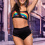 A model wears an under-boob cutout crop top and panty set with rainbow motifs arching over the cutouts at the under-boob.