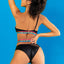 Back view of a model wearing a one shoulder top and panty set with a bikini style rear.