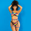 Model wears a top and panty with elastic trim with "Show off your true colors" motto around the underbust, waist and thighs.
