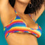 Close-up of a model wearing a wire-free bralette crop top with a rainbow crochet print in a stretchy elastane finish.