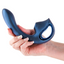A hand model holds a metallic navy blue G-spot vibrator with a suction chamber. 