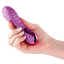 A hand model holds a mini pink silicone vibrator showcasing its one power button.