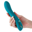 A hand model holds a teal silicone G-Spot vibrator showcasing its 2 button controls. 