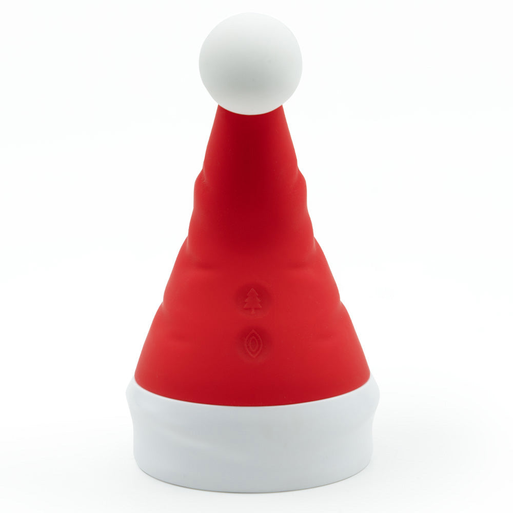 A red and white Santa hat-shaped clitoral vibrator with a white pompom shows its two control buttons.
