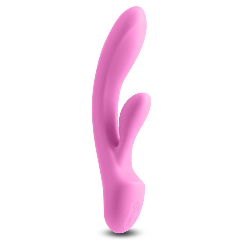 Front view of a light pink silicone rabbit vibrator with a curved G spot shaft standing against a white background.