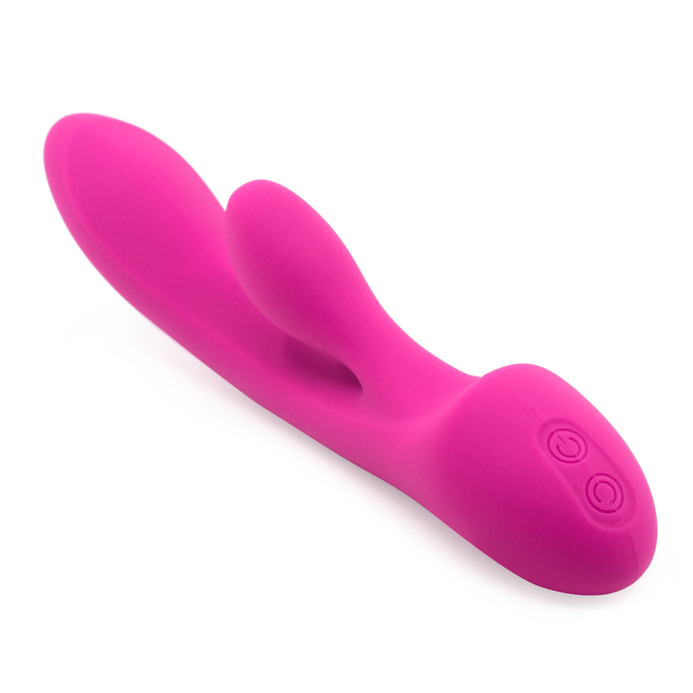 A dark pink silicone rabbit vibrator with a curved G spot shaft lays on a white background showing its two control buttons.