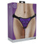 A box by Ouch stands against a white backdrop and features a female model on it wearing a purple strap-on harness. 