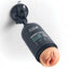 A discreet masturbator encased in a toiletry bottle is attached to a suction cup mount and stuck on a shower wall. 