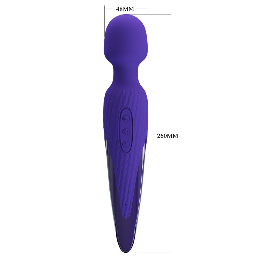 A purple warming wand vibrator stands against a white backdrop and has its height and width measurements next to it.